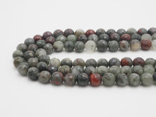 Load image into Gallery viewer, Natural Faceted Round Blood Stone beads