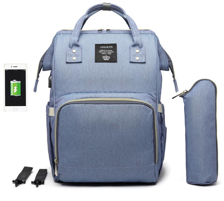 Waterproof Diaper Bag Backpack with USB Charging Port | Large Capacity Travel Nursing Bag for Moms & Dads