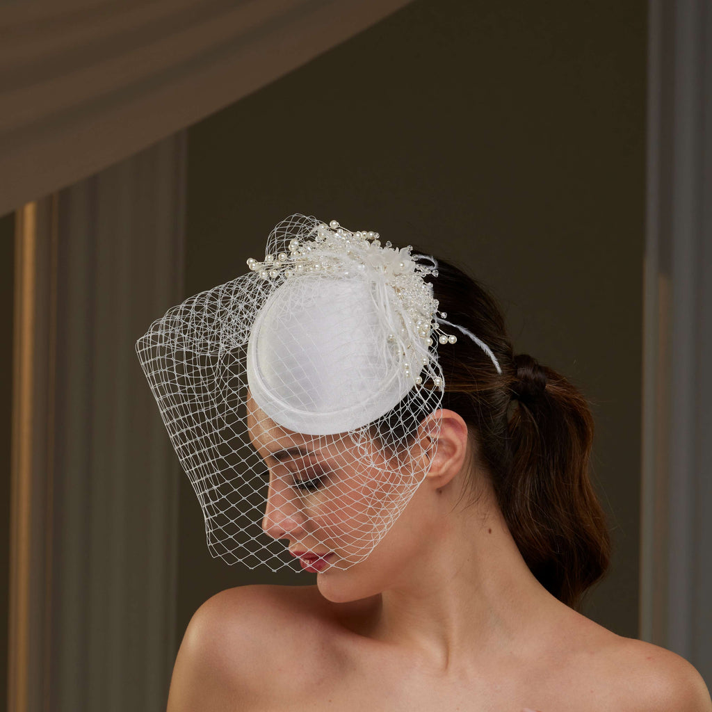 Elegant  Bridal Fascinator with Birdcage Veil, Pearls & Feathers