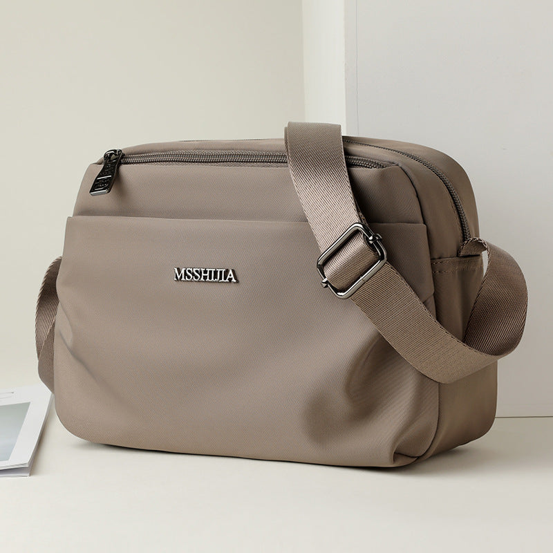Women's Casual Multi-Compartment Crossbody Bag – Fabric Shoulder Bag with Patchwork Detail