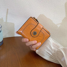 Load image into Gallery viewer, Women's Vintage Oil Leather Wallet - Floral Embossed Short Bifold with RFID Protection