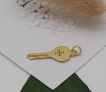 Load image into Gallery viewer, CZ North Star On Key Shape Charm, Sku#LK615