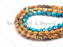 Load image into Gallery viewer, Yellow Blue Orange Mottled Jade Carved Skull Beads, Round Sm