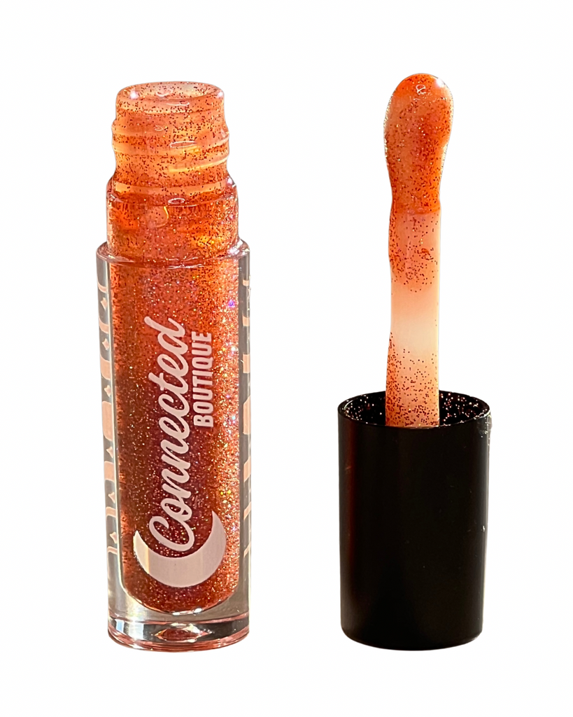 Promise pink duochrome lip gloss with duochrome glitter apple scented
