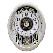Load image into Gallery viewer, Moving Face Pendulum Wall Clock - Plays Melodies Every Hour