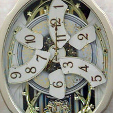 Load image into Gallery viewer, Moving Face Pendulum Wall Clock - Plays Melodies Every Hour