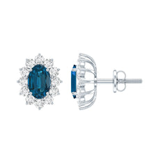 Load image into Gallery viewer, 1.6 Carat Oval London Blue Topaz Stud Earrings with Diamond Halo