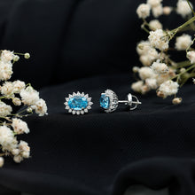 Load image into Gallery viewer, 1.6 Carat Oval London Blue Topaz Stud Earrings with Diamond Halo
