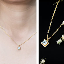 Load image into Gallery viewer, Sterling Silver Half Carat Princess Cut Sky Blue Topaz Pendant Necklace with Chain
