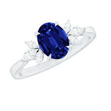 Load image into Gallery viewer, Certified 1.5 Carat Oval Lab Grown Blue Sapphire Engagement Ring with Diamond Trio