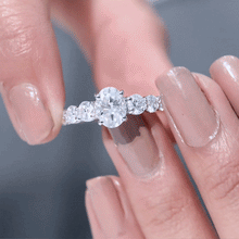 Load image into Gallery viewer, 1.2 Carat Oval Cut Moissanite Side Stone Engagement Ring