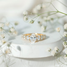 Load image into Gallery viewer, 1.2 Carat Oval Cut Moissanite Side Stone Engagement Ring