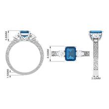 Load image into Gallery viewer, 6X8mm Emerald Cut London Blue Topaz Statement Ring with Engraved Shank