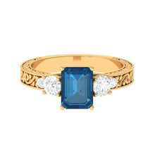 Load image into Gallery viewer, 6X8mm Emerald Cut London Blue Topaz Statement Ring with Engraved Shank