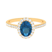 Load image into Gallery viewer, 2 CT Oval Cut London Blue Topaz Solitaire Ring with Diamond Halo