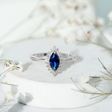 Load image into Gallery viewer, Marquise Cut Lab Grown Blue Sapphire and Diamond Halo Engagement Ring