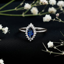 Load image into Gallery viewer, Marquise Cut Lab Grown Blue Sapphire and Diamond Halo Engagement Ring