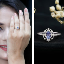 Load image into Gallery viewer, Vintage Looking Tanzanite and Diamond Oval Engagement Ring