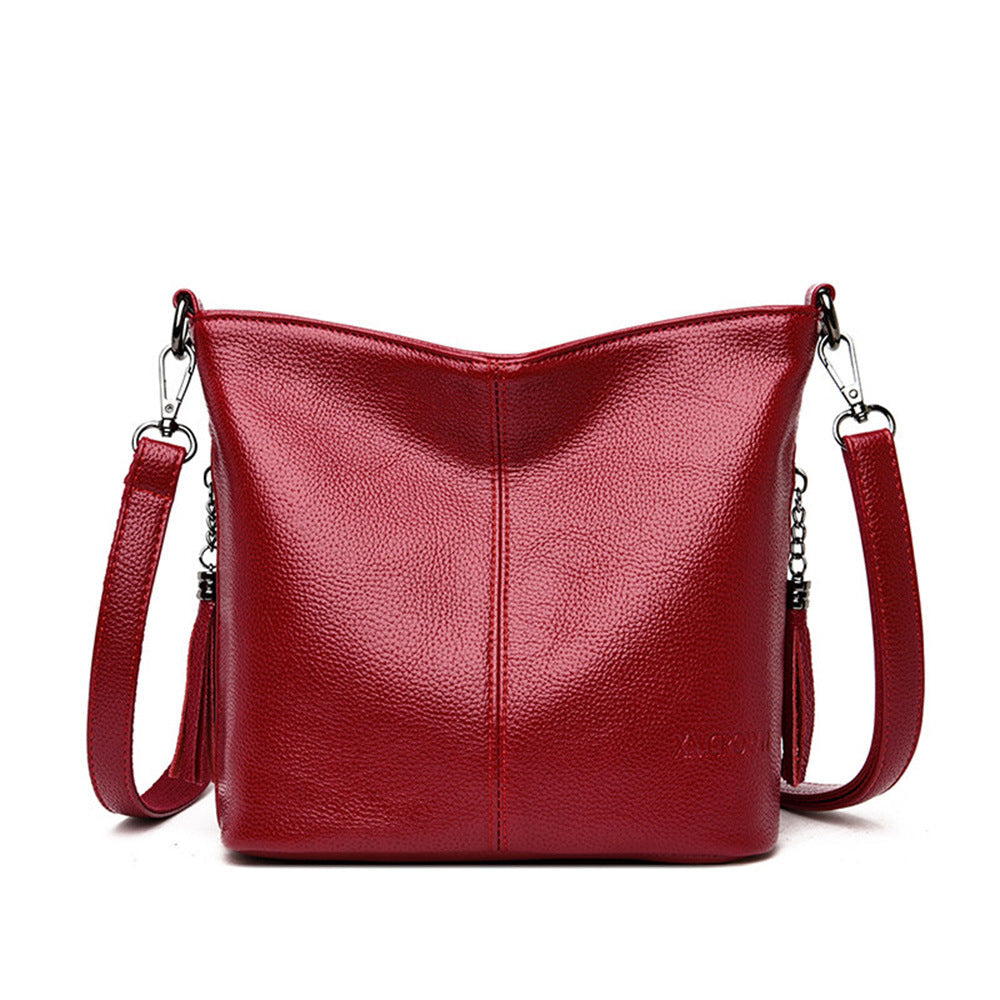 Women's High-Capacity Tassel Crossbody Bag – Leather Bucket Bag with Zipper Pocket