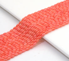 Load image into Gallery viewer, Pink Coral Smooth Rice Shape Beads, Sku#U1482