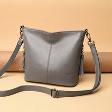 Load image into Gallery viewer, Women's High-Capacity Tassel Crossbody Bag – Leather Bucket Bag with Zipper Pocket