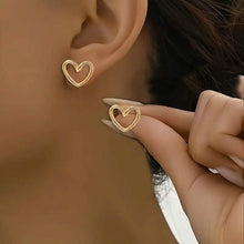 Load image into Gallery viewer, Glossy Hollow Heart Design Stud Earrings