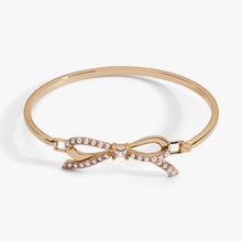 Load image into Gallery viewer, Bow Pearl Coquette Tension Bangle