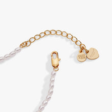 Load image into Gallery viewer, Sweethearts® ‘XOXO’ Heart Charm Beaded Pearl Bracelet
